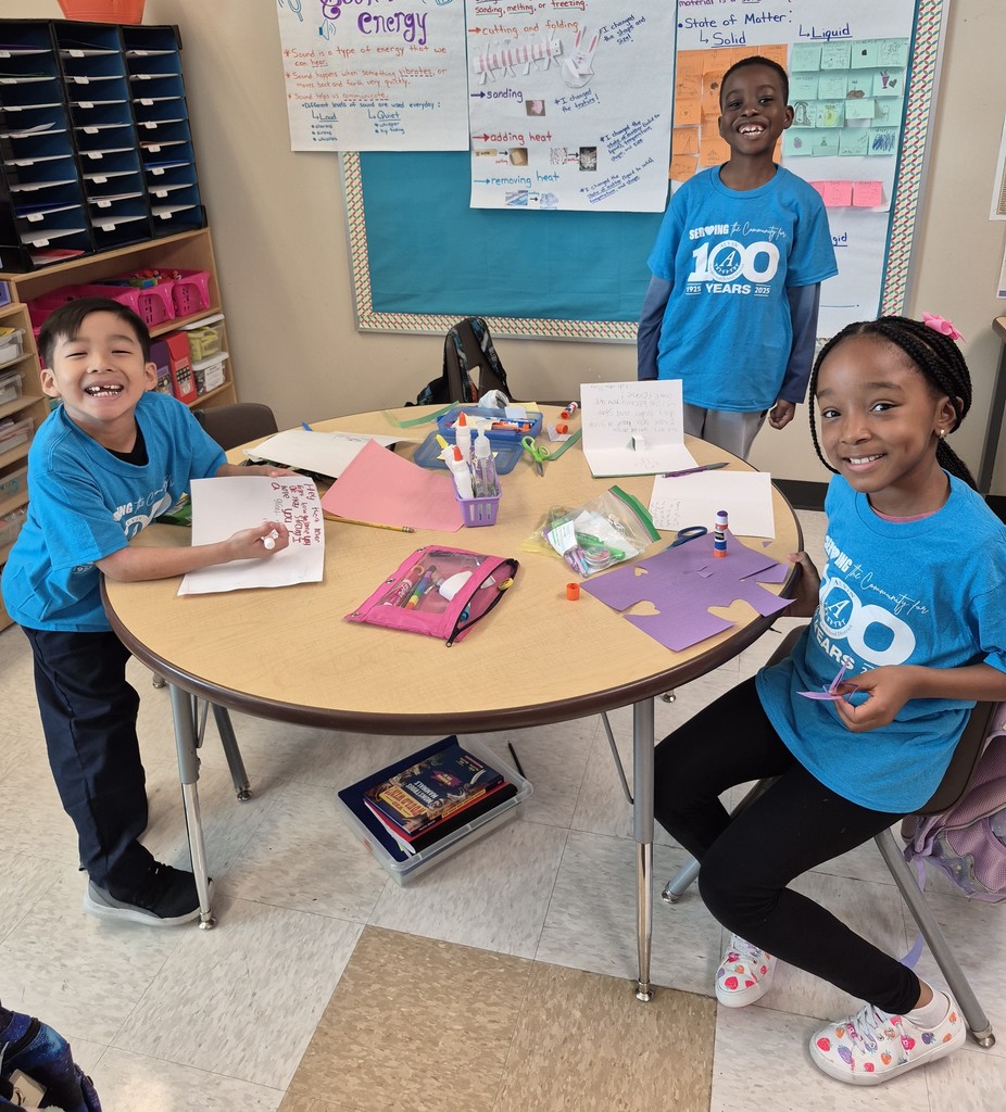 Second grade pictures of students working on their cards for children in the hospital