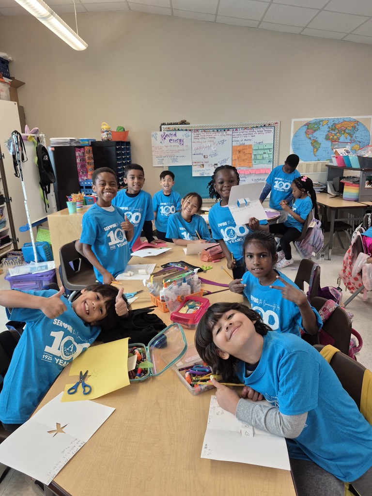 Second grade pictures of students working on their cards for children in the hospital