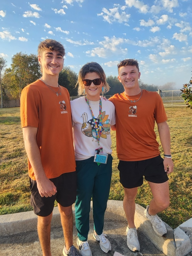 AHS athletes with Coach Magness