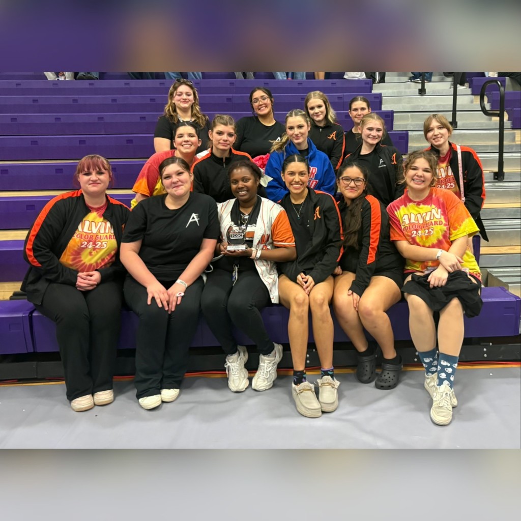 colorguard team with the 3rd place trophy