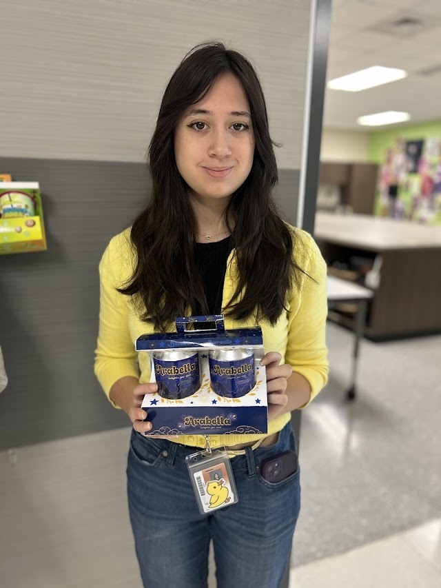 Graphic Design II students working on drink packaging project