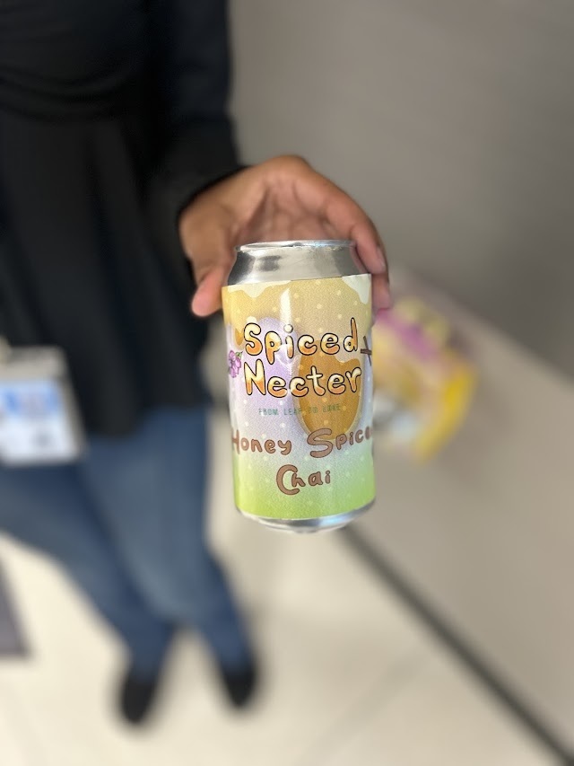 Graphic Design II students working on drink packaging project