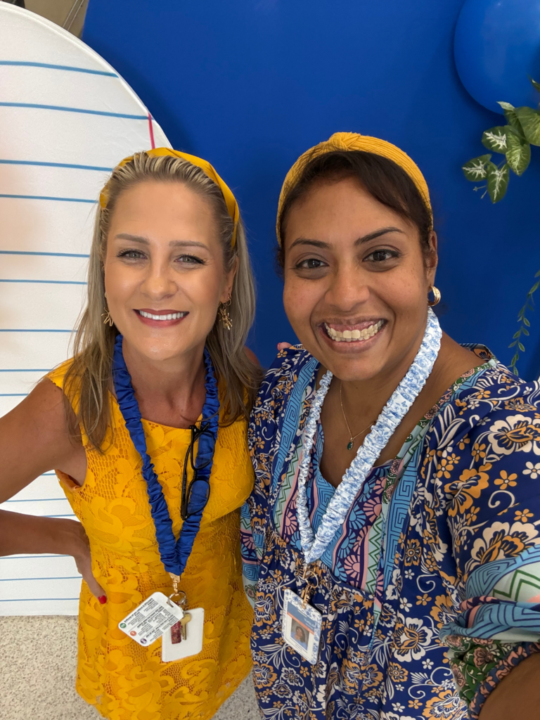 Teachers posing with smiles during back to school activities