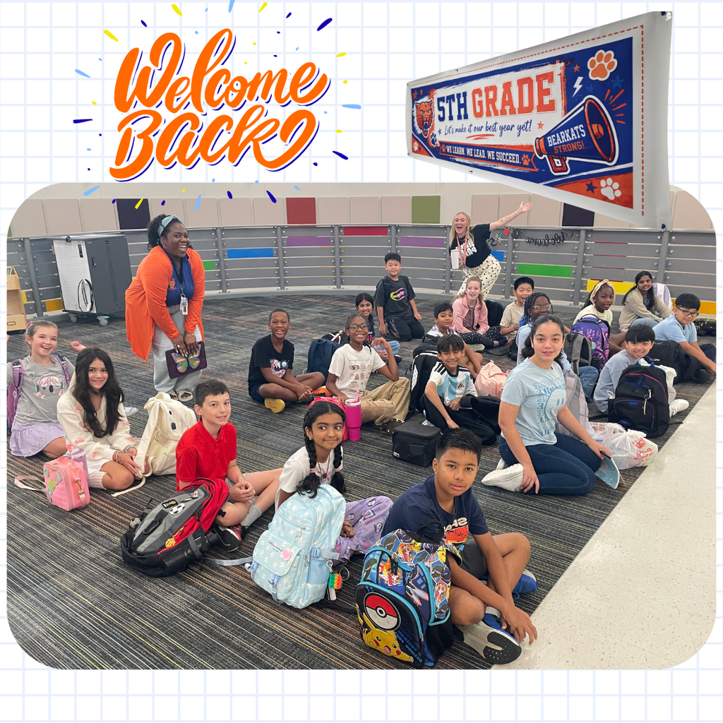 Welcome back.  A banner that says 5th grade.  Fifth grade students waiting for the morning music to play.