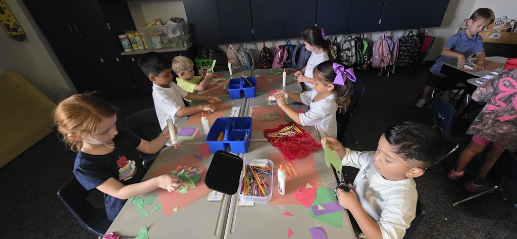 children cutting paper