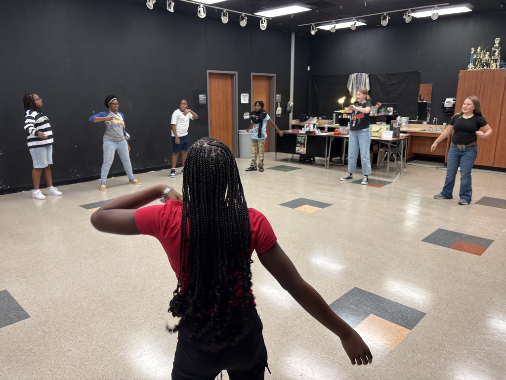 Theater students learn each other's names through movement!