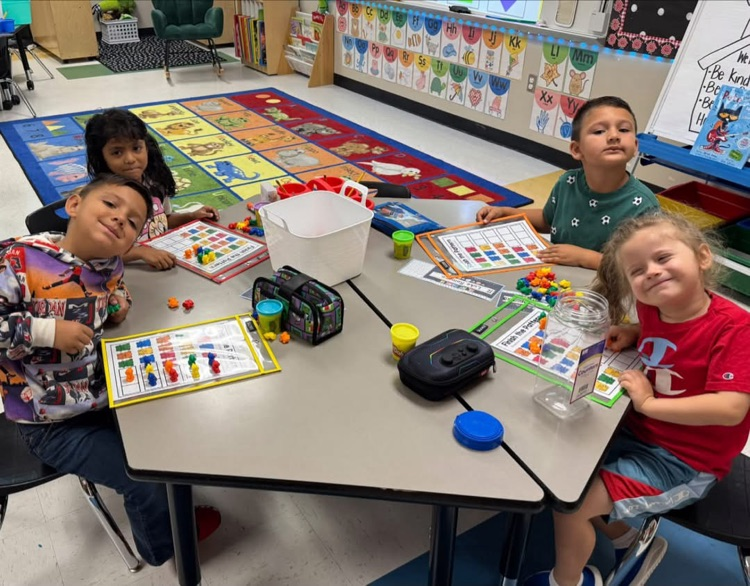 Students learn at math stations