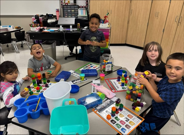 Students learn at math stations