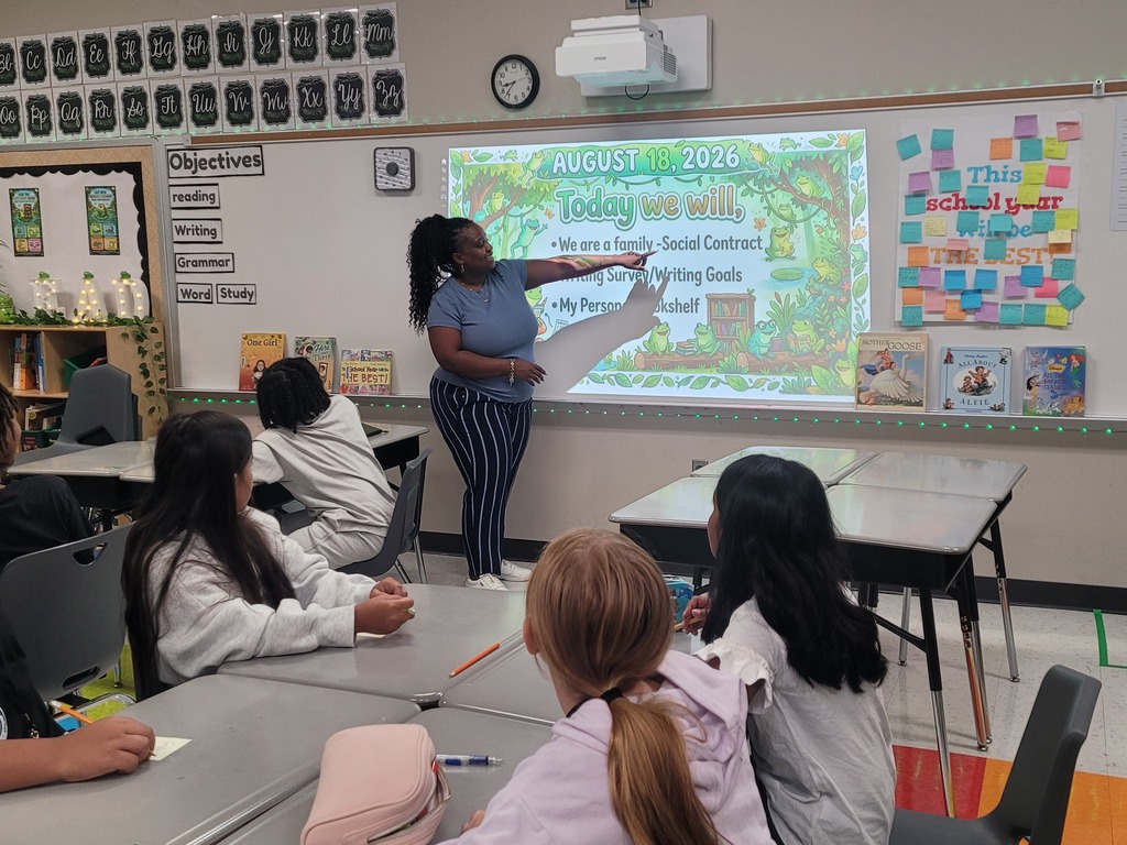 Fifth grade teacher leading her students in building a social contract for capturing kids hearts.