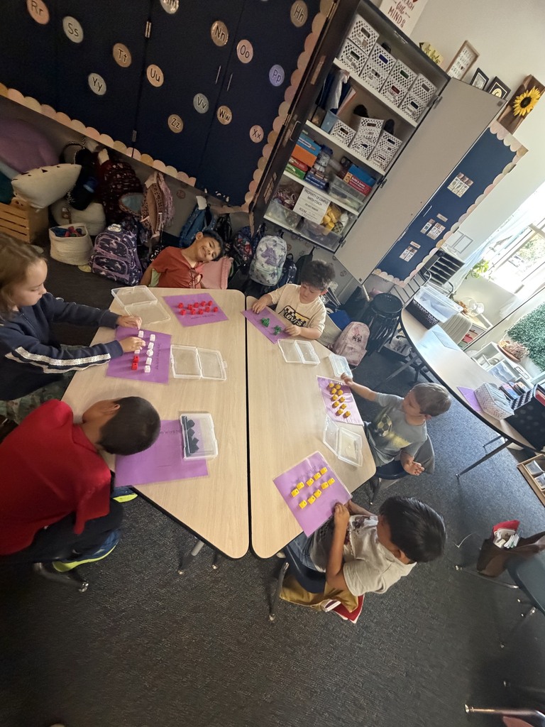 kids working with math blocks