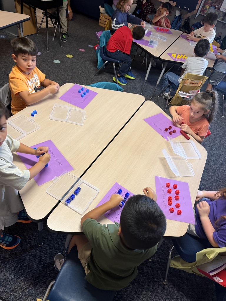 kids working with math blocks