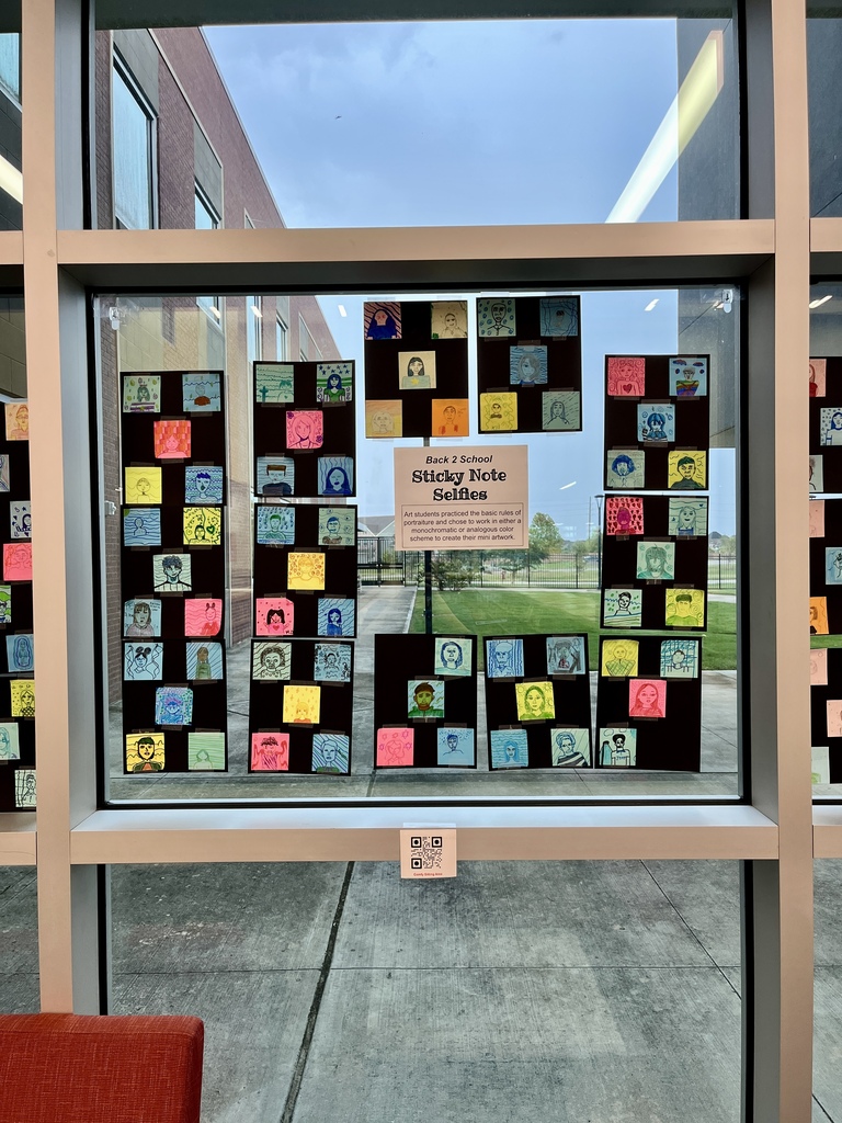 Photo of display of "Sticky Note Selfies"