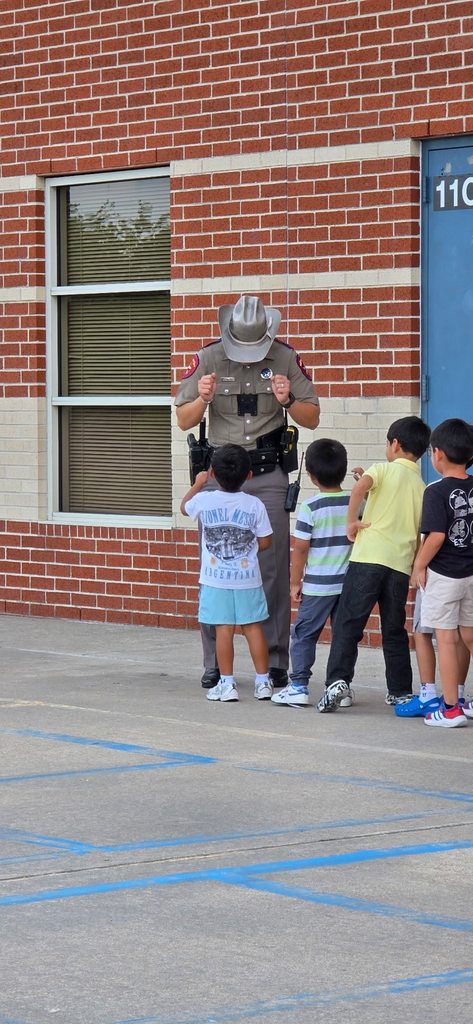 officer playing with kids