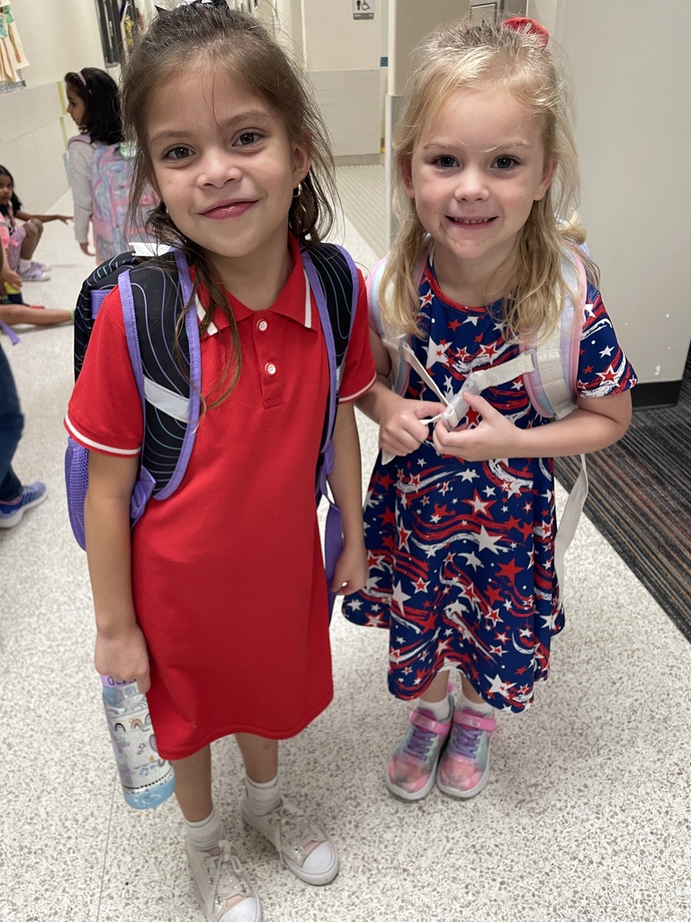 students posing together dressed in patriotic colors for patriots day