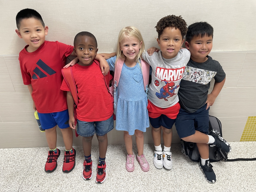 students posing together dressed in patriotic colors for patriots day