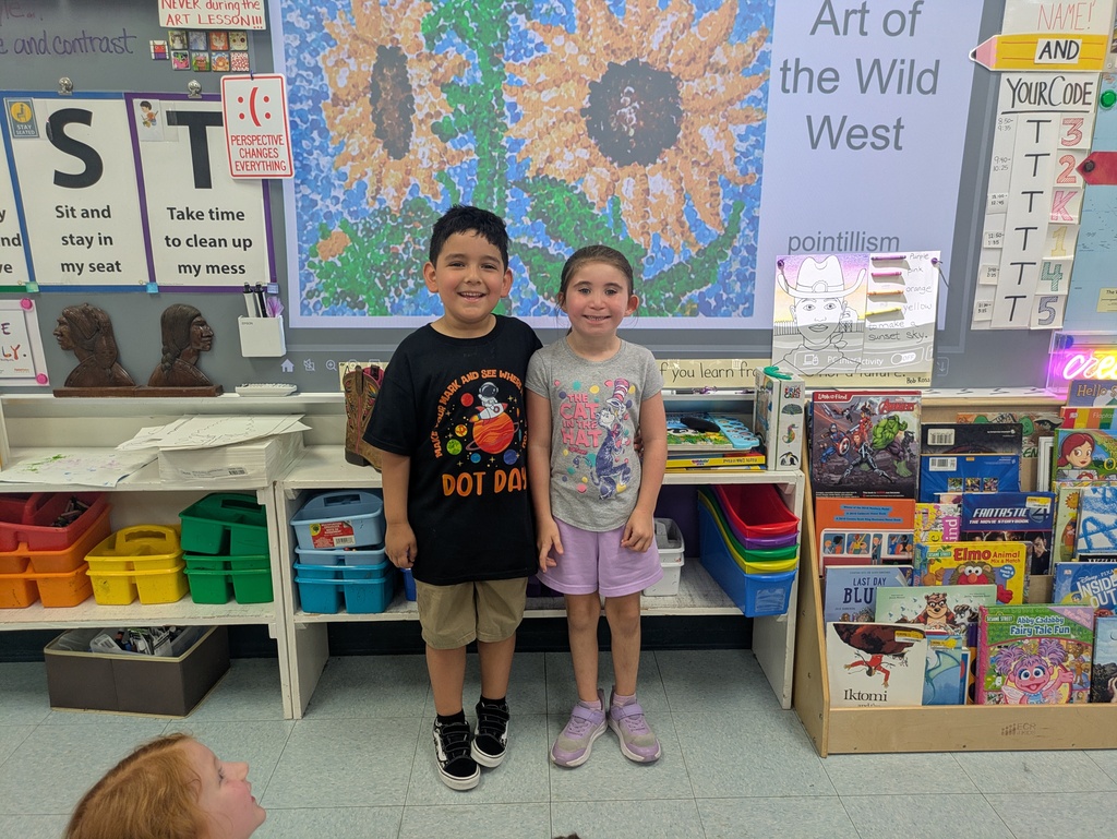 kids in dot day shirts
