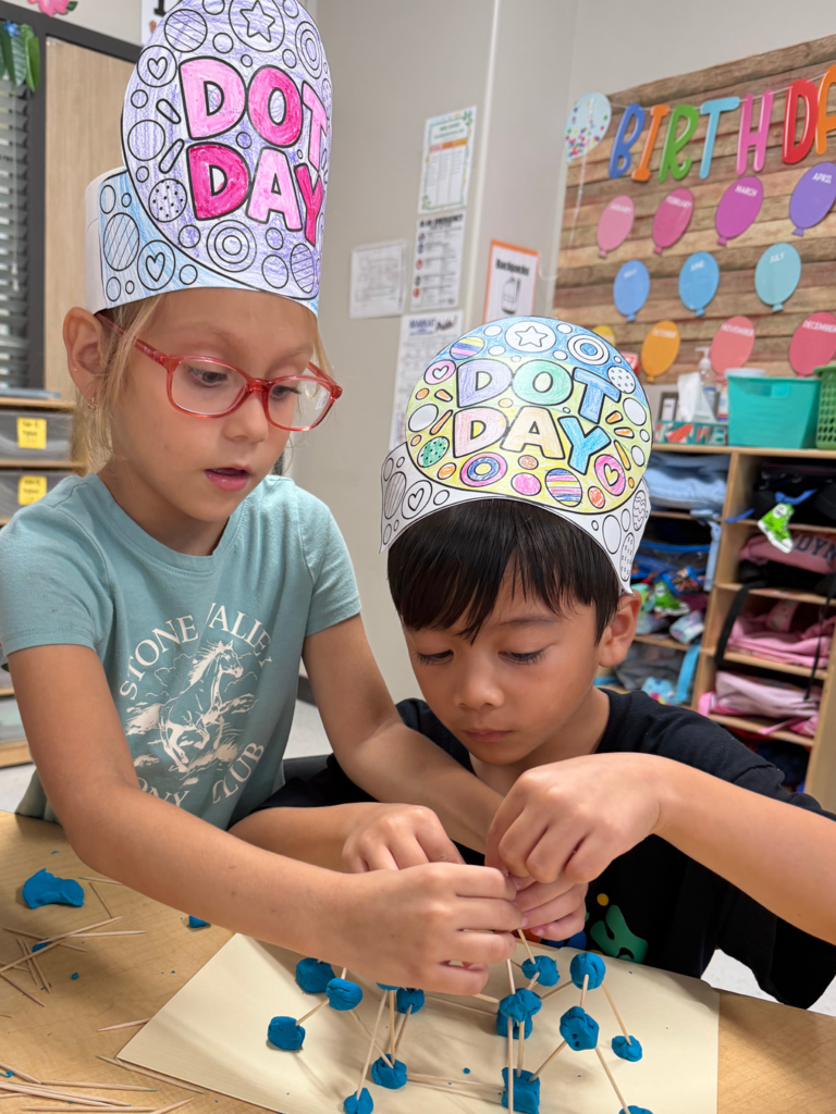 two students building out of tooth picks and playdough dots for dot day