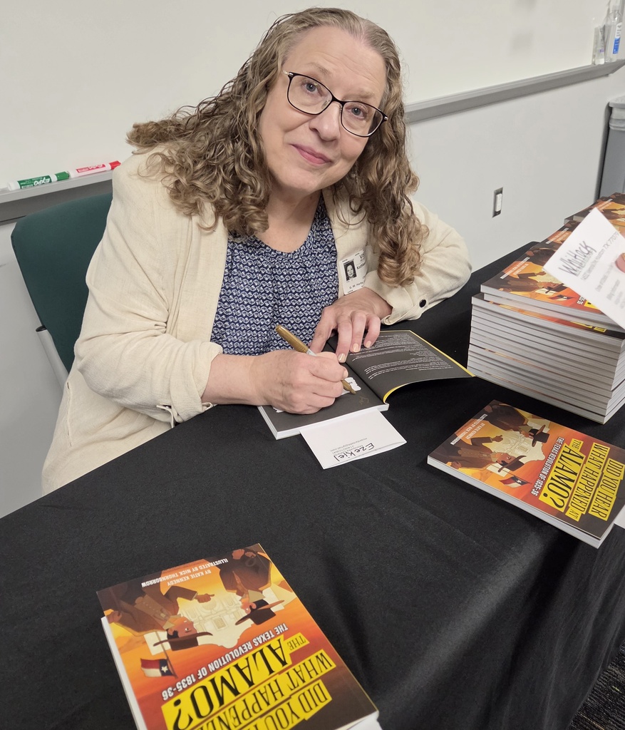 Katie Kennedy signing books