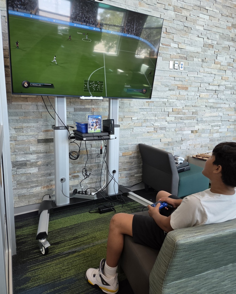 Student playing on the new gaming system