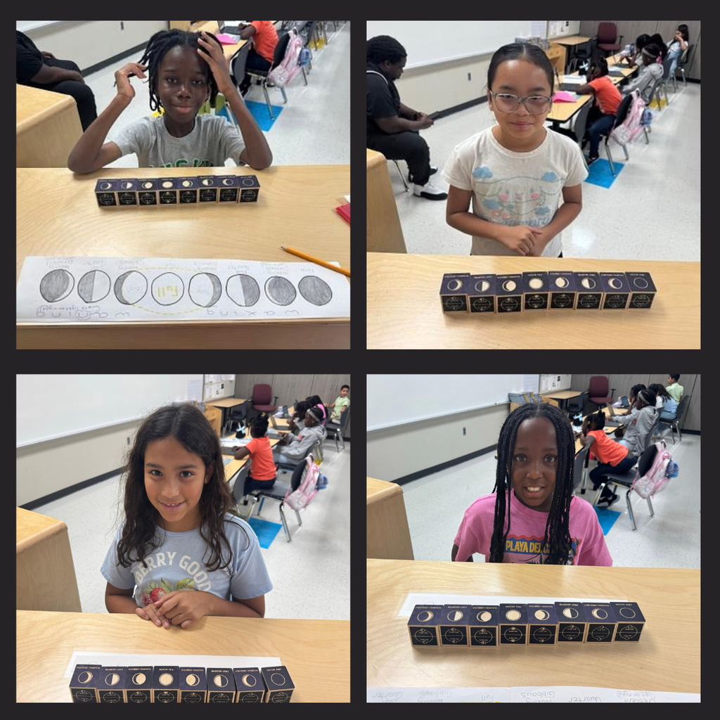Fourth grade students with lunar cubes practicing the phases of the moon.