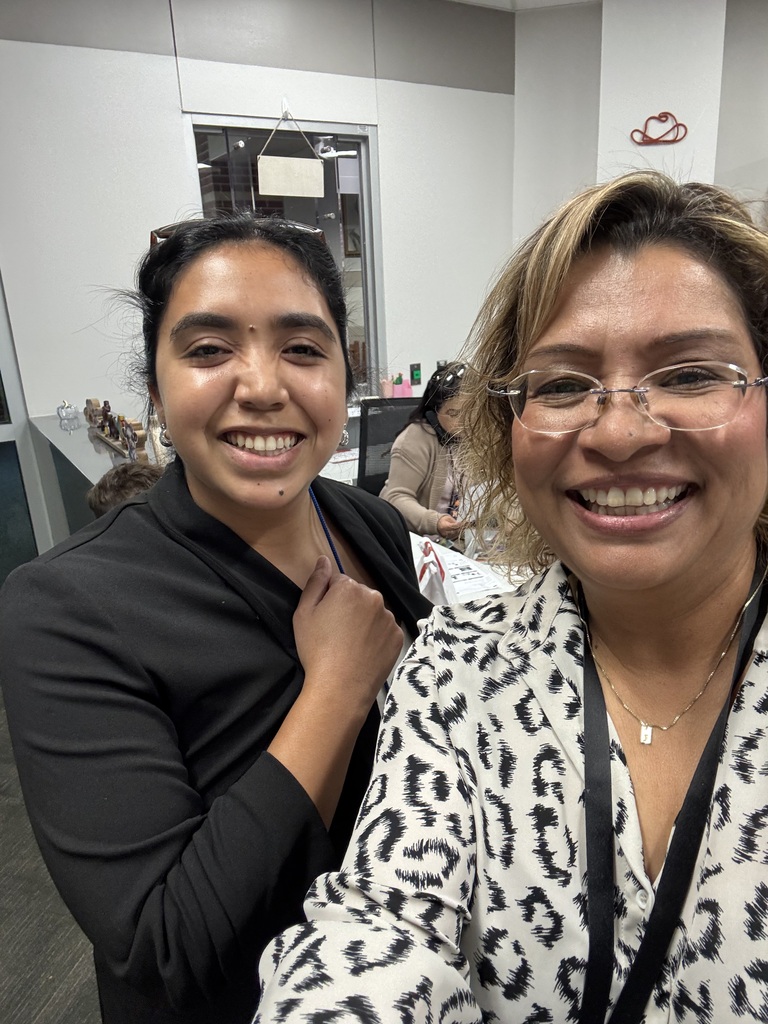 2 women wearing blazers