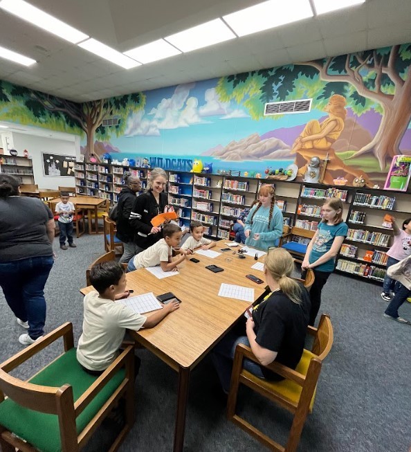 students participating in library olympics