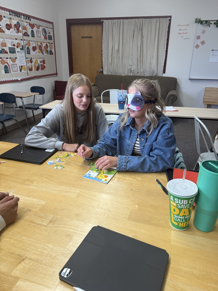 student doing puzzle