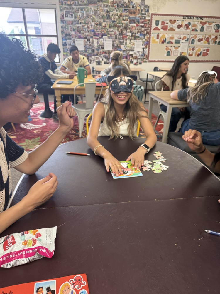 student doing puzzle