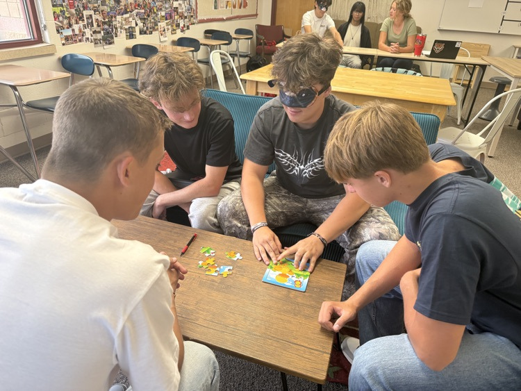 student doing puzzle