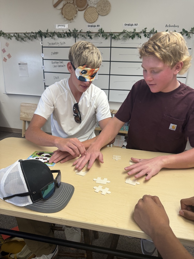 student doing puzzle
