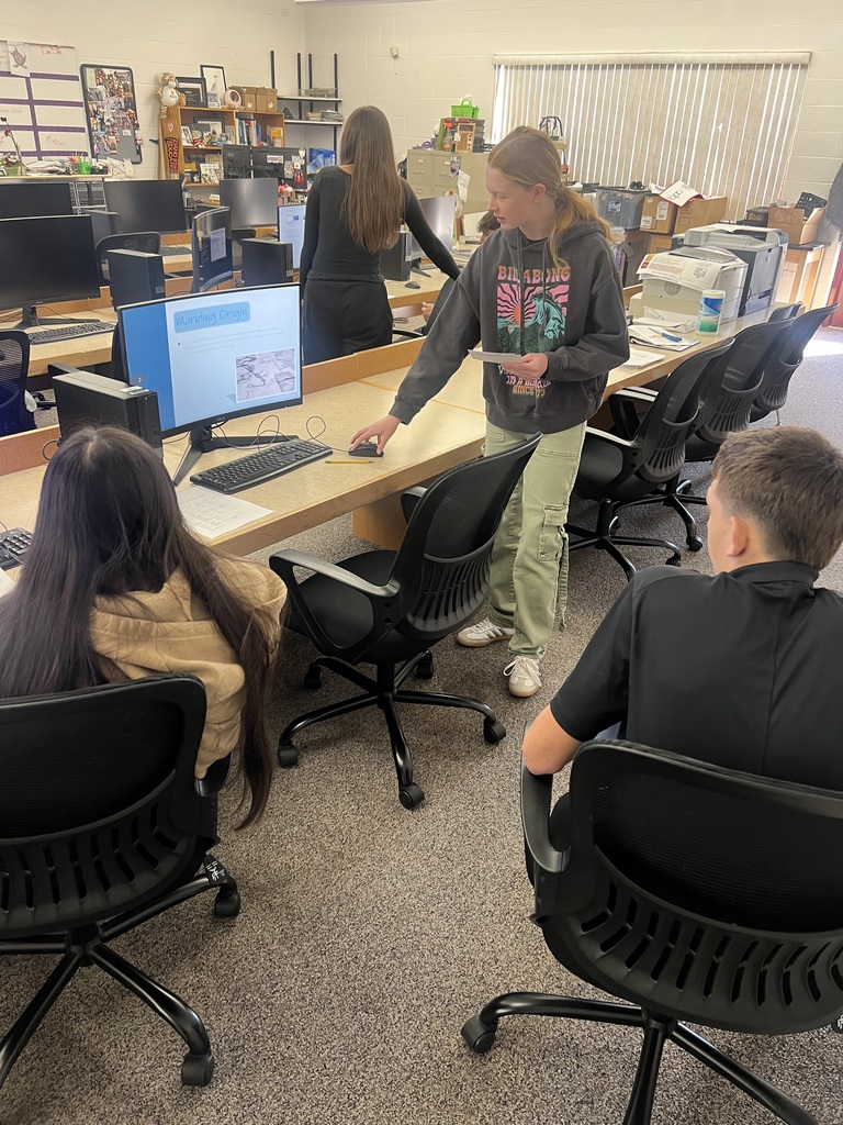 Student showing her PowerPoint