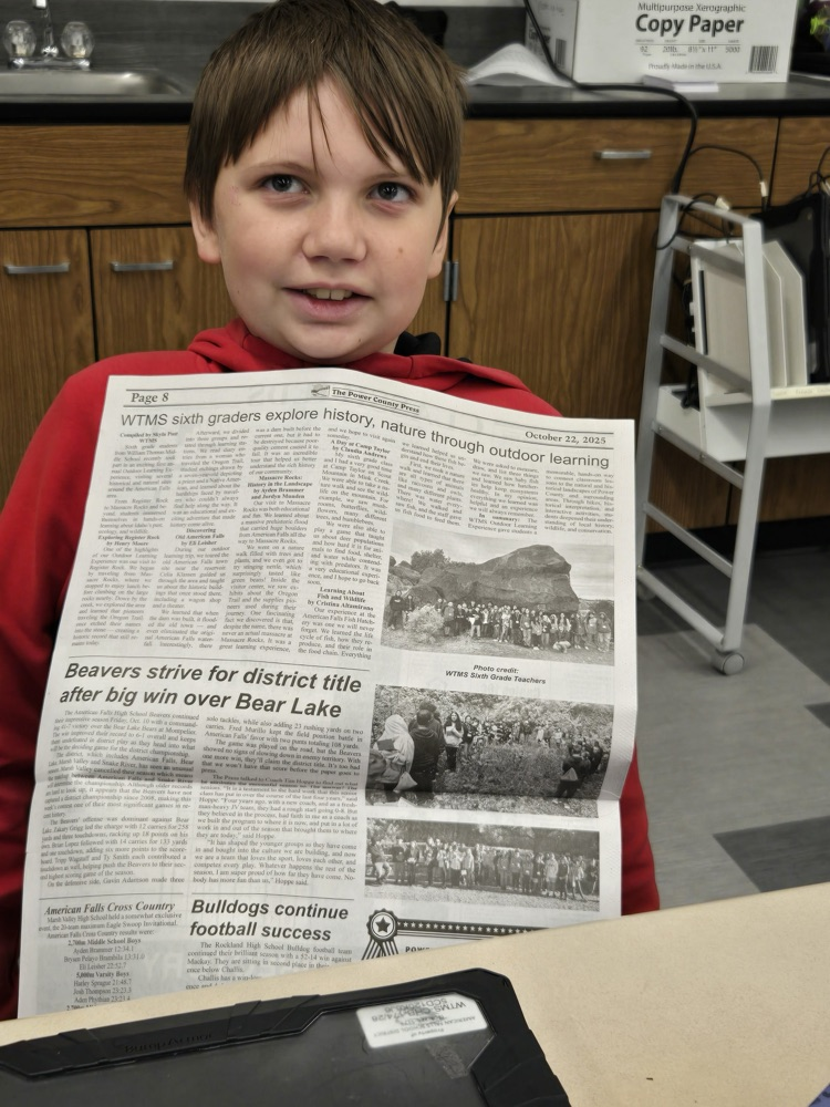 Eli with his newspaper 