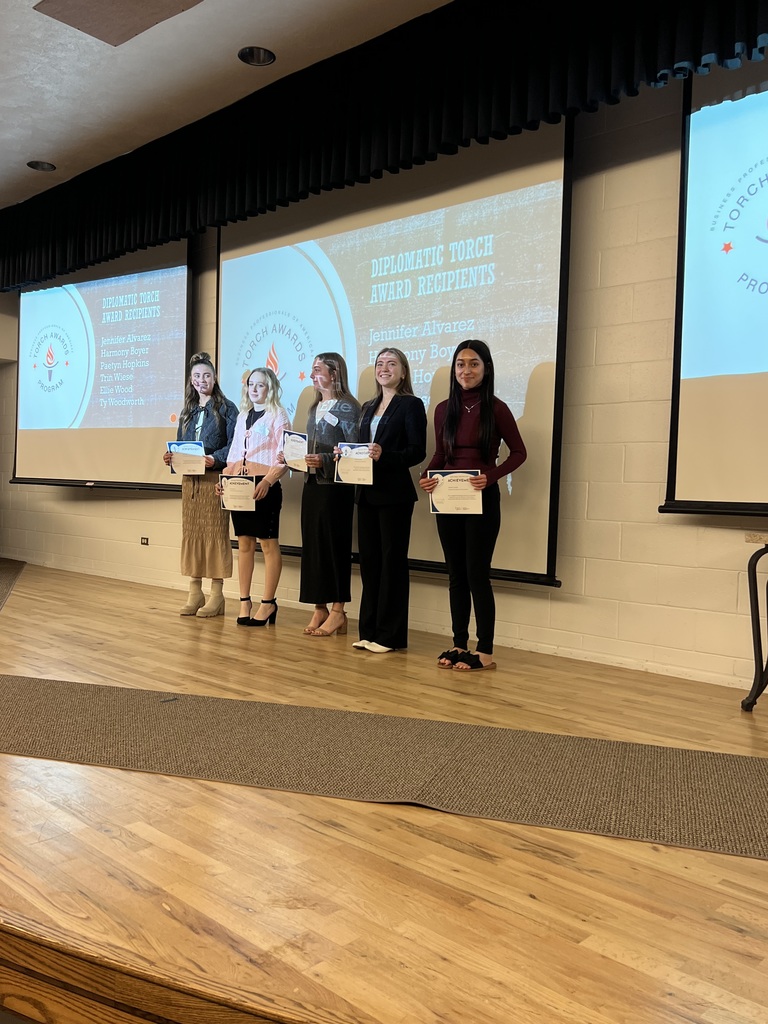 Jayleen A. getting her award in Torch Awards