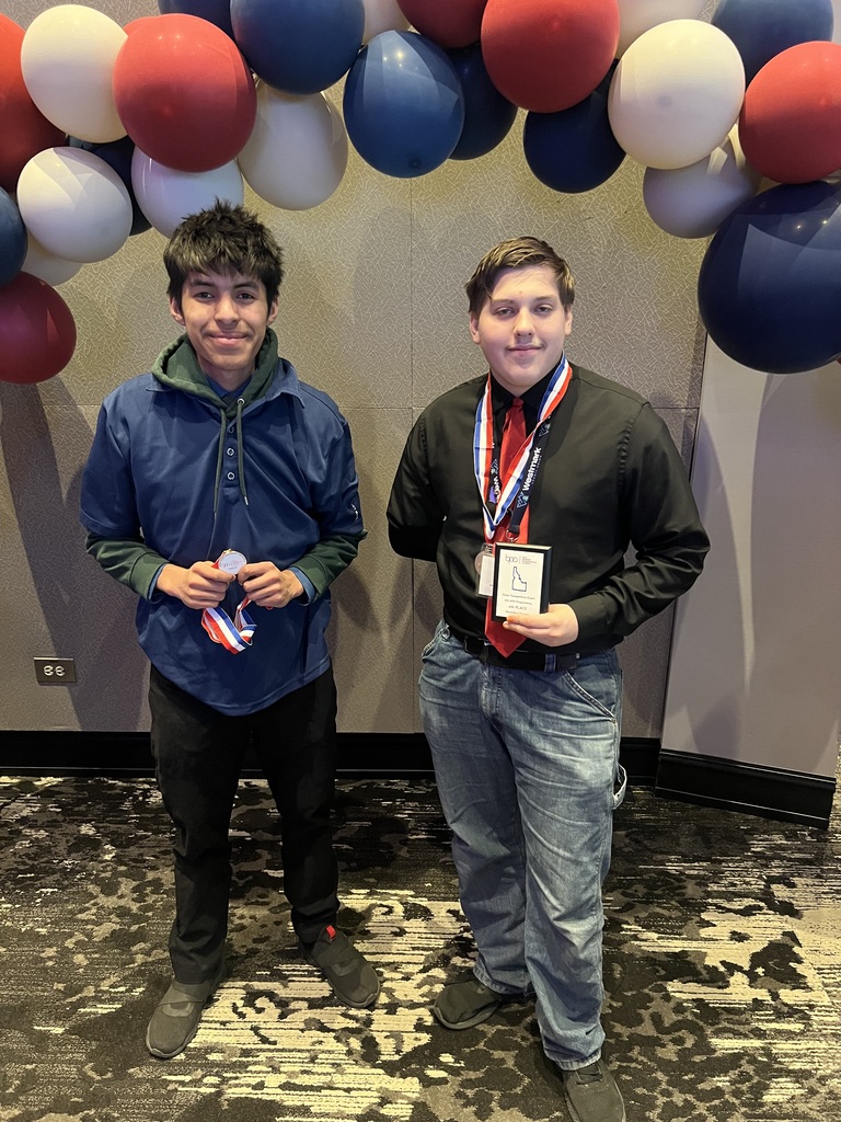 Adam C. and Alan Torres showing off their medals