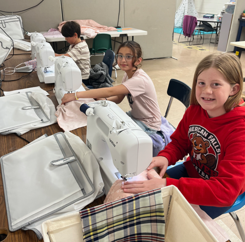 These students earned enough points to buy time with Mrs. Anderson to make a pillow. Great job!!