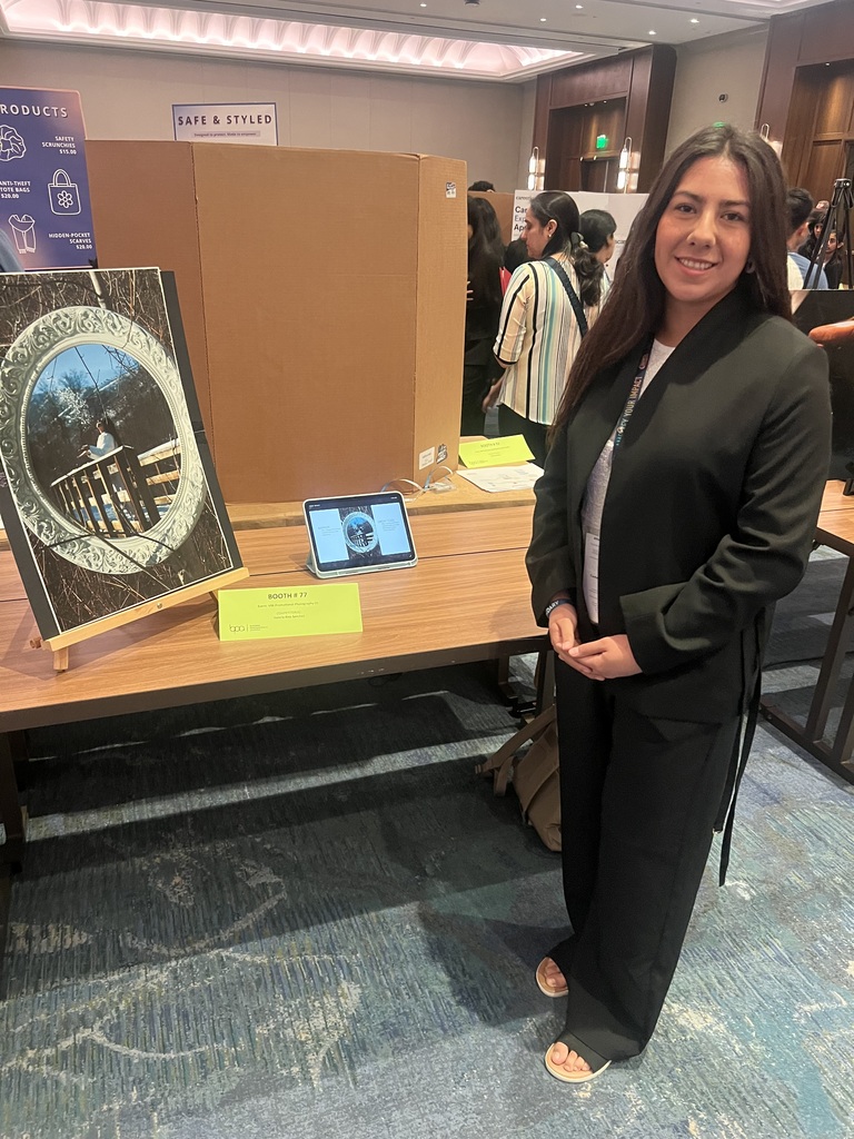 Valerie Rios Sanchez showing off her amazing photograph at the National Showcase