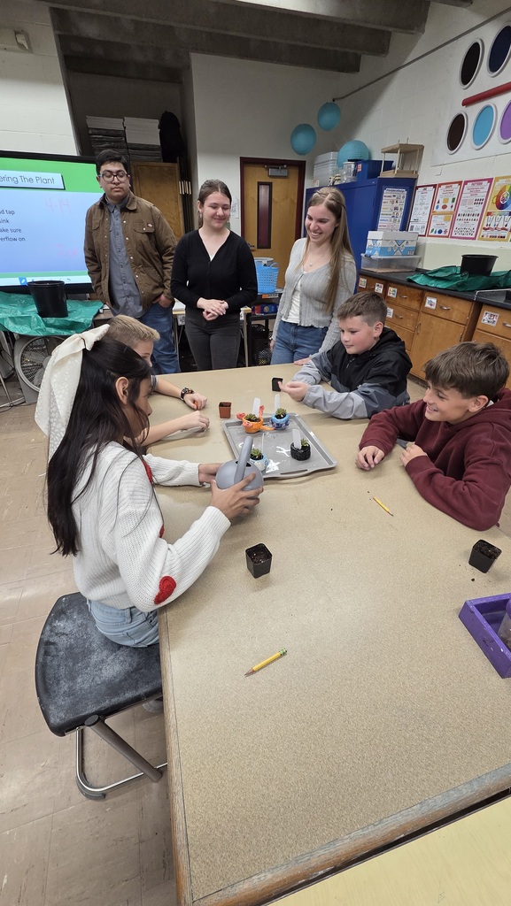FFA members teaching 5th graders about potting-5