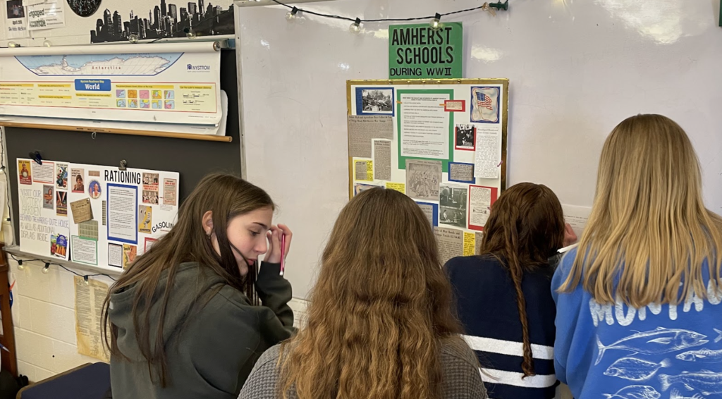 Students checking out displays they created about the homefront and local history: 