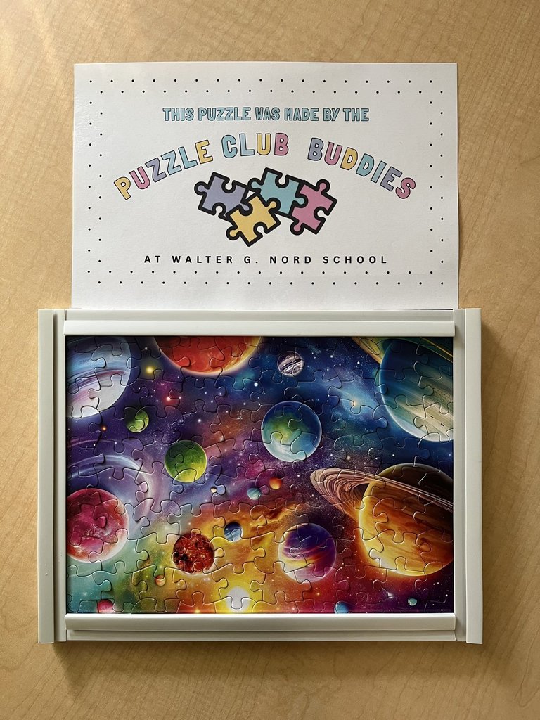 Picture of a puzzle that they donated to the Board Office 