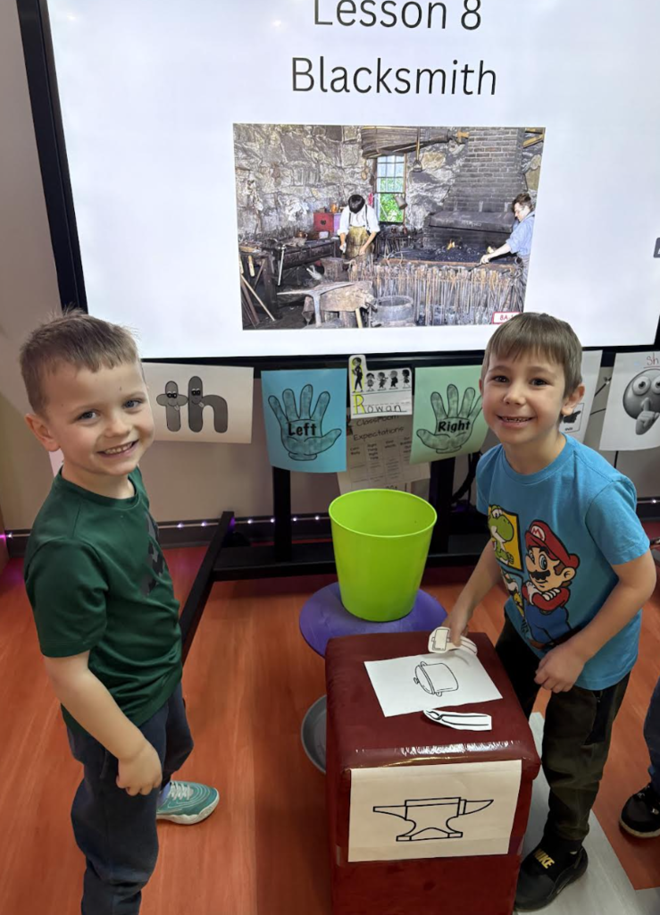 students demonstrating their lesson in blacksmith 