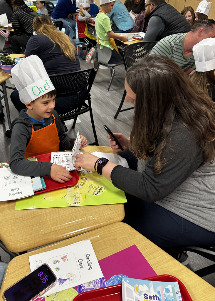 Parent reading with their Kindergartner