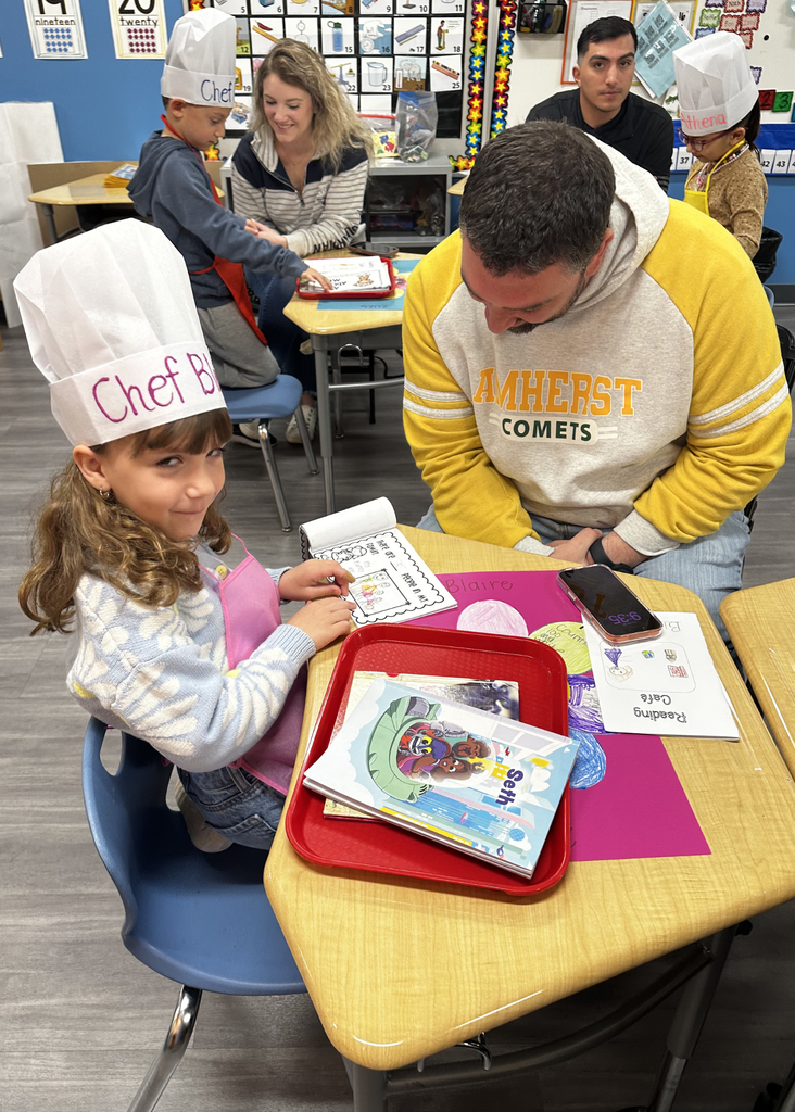 Parent reading with their Kindergartner
