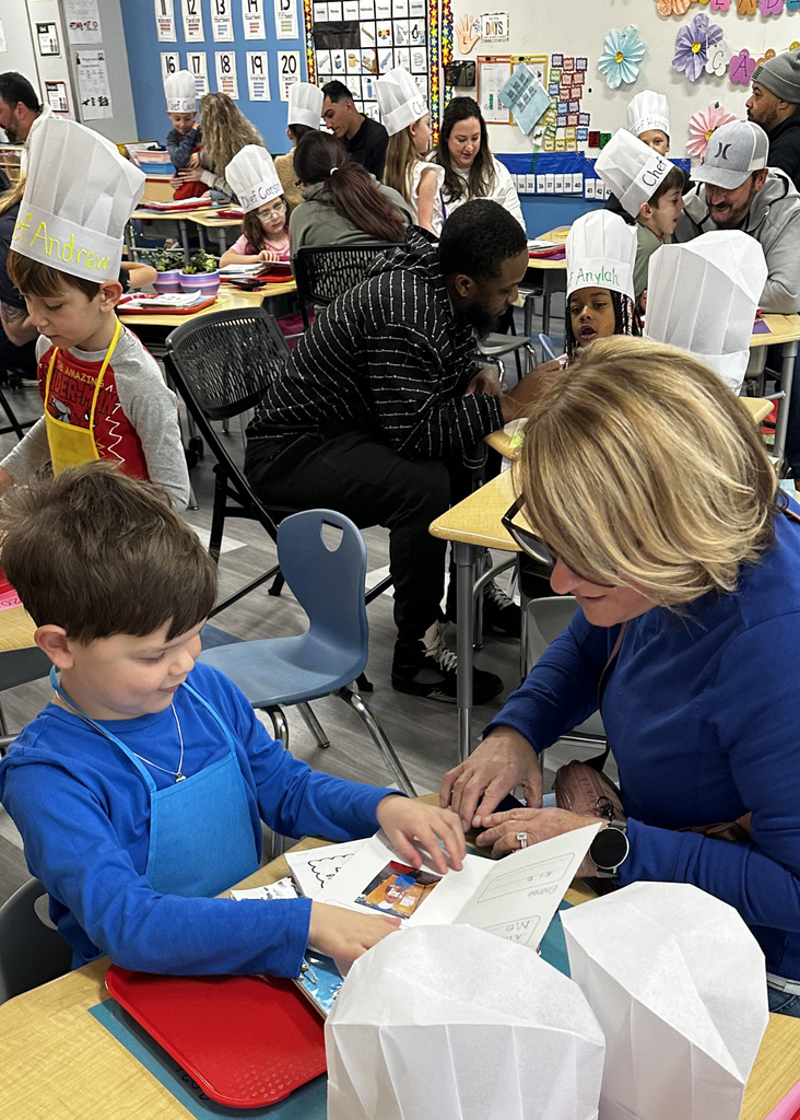 Parent reading with their Kindergartner