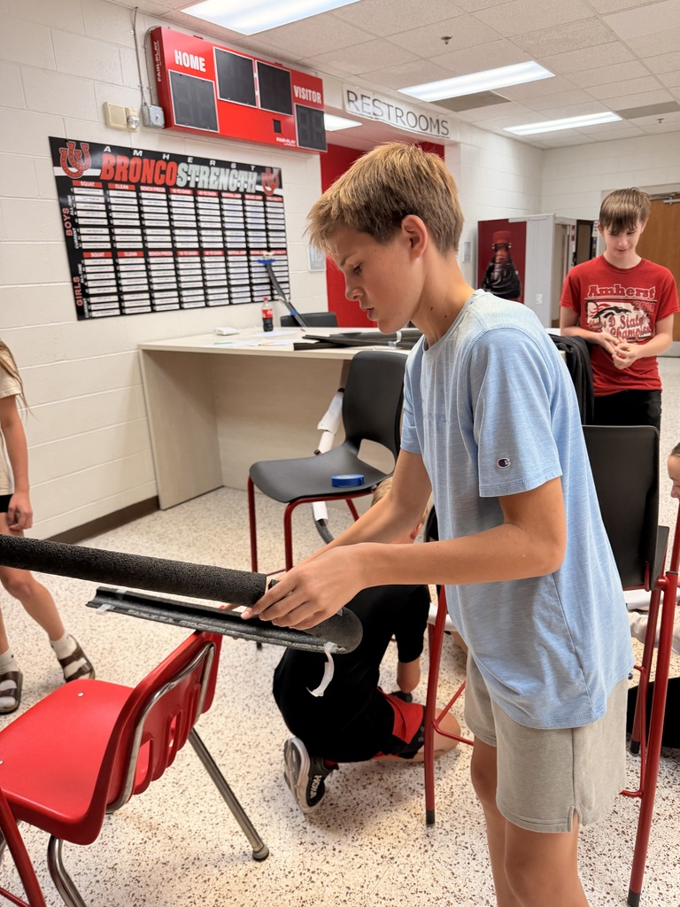 Students work on a roller coaster lab