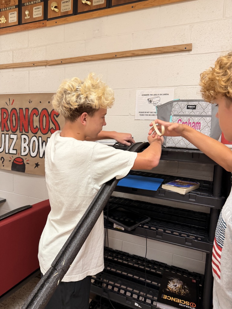 Students work on a roller coaster lab
