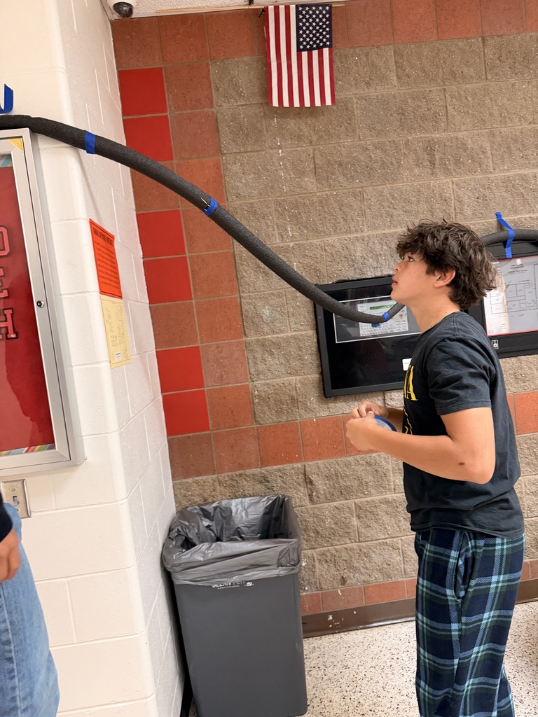 Students work on a roller coaster lab
