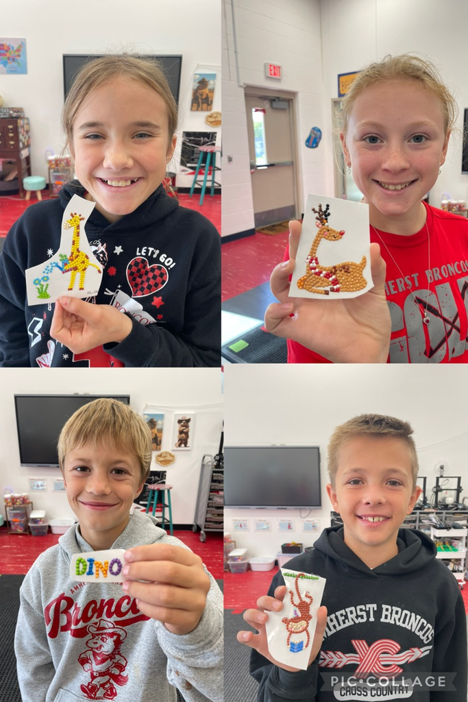 elementary kids that finished one piece of diamond art