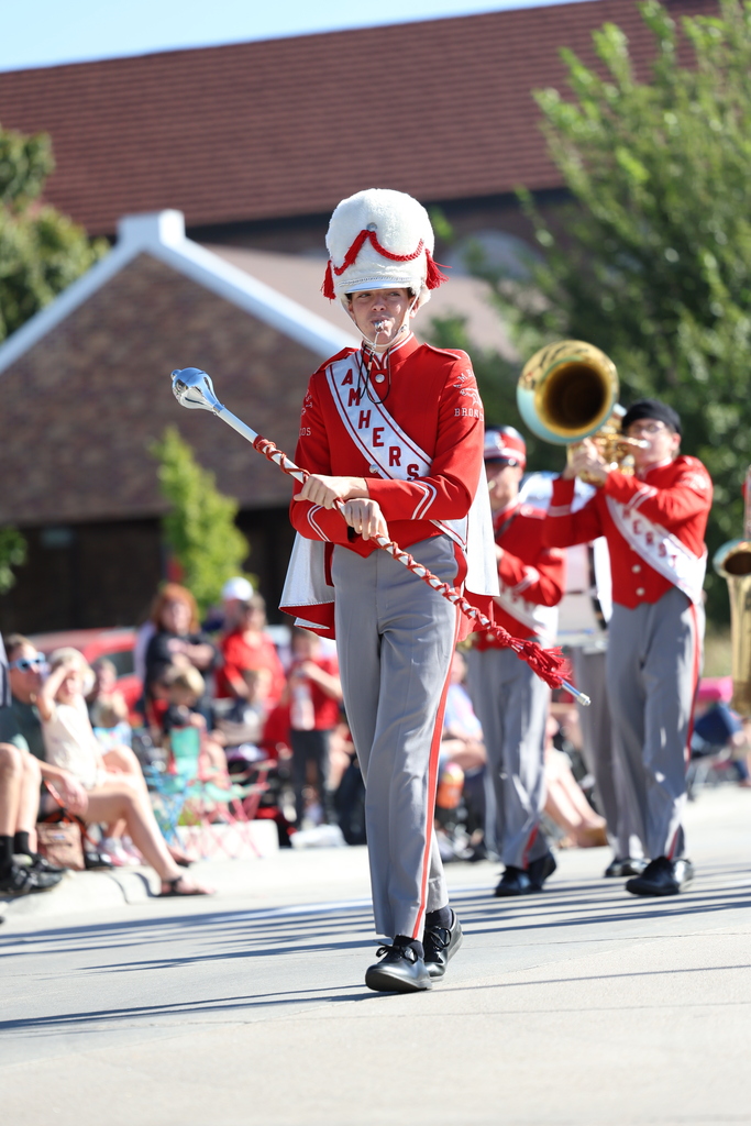 Amherst Band marches down city street