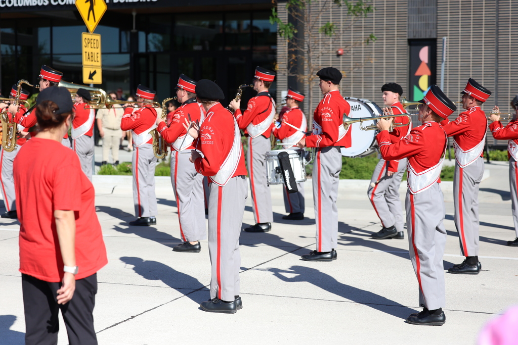 Amherst Band marches down city street