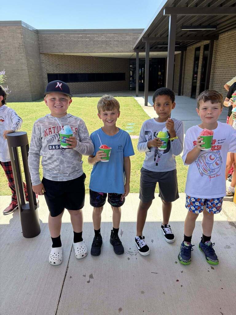 Students enjoying snowcones. 